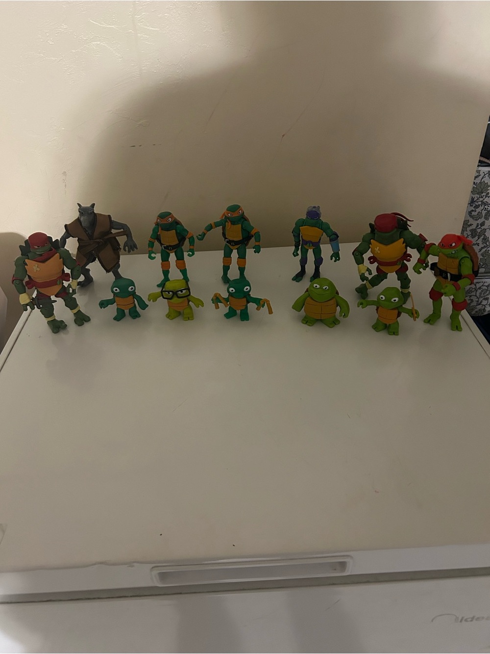 Lot of 13 teenage mutant ninja turtle action figures
